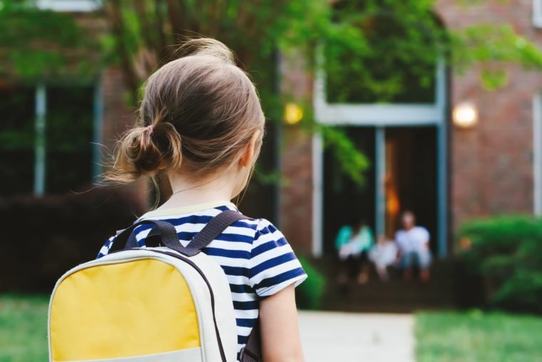 young girl going to school