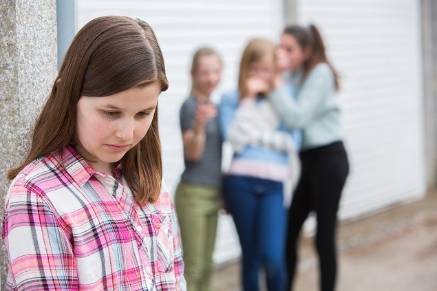 young girl being teased